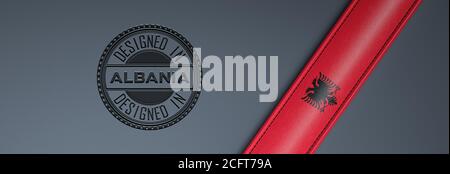 Designed in Albanien Stempel & albanische Flagge. Stockfoto