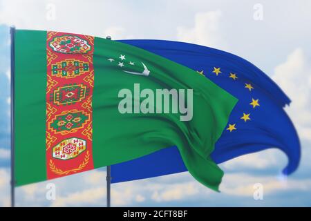 Flagge und Flagge Turkmenistans schwenken. Nahaufnahme, 3D-Illustration. Stockfoto