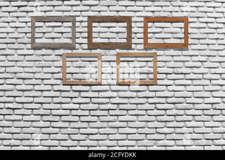Vintage-Bilderrahmen auf Backsteinwand für innen oder Hintergrund. Stockfoto