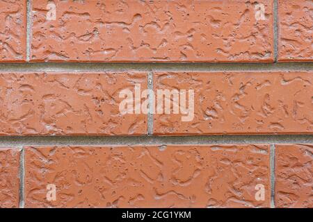 Nahaufnahme der roten Backsteinmauer. Hintergrund der Steinwand Textur Stockfoto