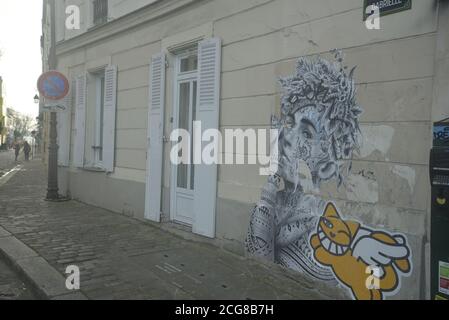 Straßenkunst auf einer gepflasterten Straße in Paris, pasakdek Stockfoto