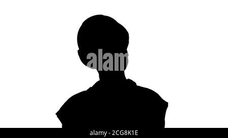 Silhouette Junge Bauarbeiter mit Tablet-Computer präsentiert etwas. Stockfoto