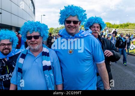 Manchester City-Fans kommen im Amex Stadium zu ihrem Final Game der Saison und Premier League Title Clincher gegen Brighton und Hove Albion. Stockfoto