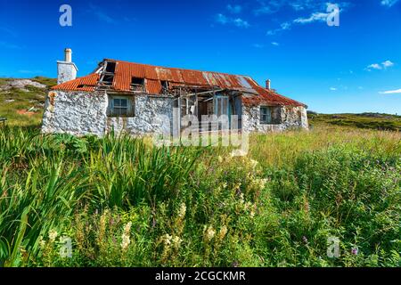 Ein altes verderbtes Häuschen in Quidnish auf der Insel Von Harris in Schottland Stockfoto