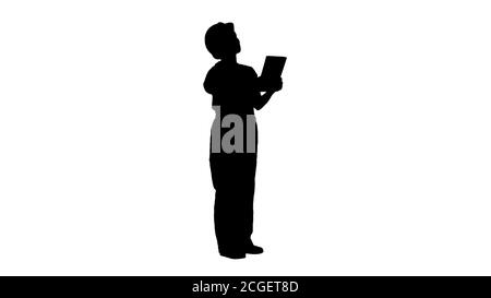 Silhouette Ingenieurin in gelb Schutzhelm ist auf Tablet-Computer suchen, während die Überprüfung für Baugebäude. Stockfoto