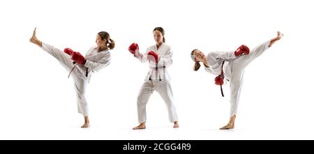 Team. Junior in Kimono üben Taekwondo Kampf, Kampfkunst. Junge weibliche Kämpfer mit roten Handschuhen Training auf weißem Studio Hintergrund in Bewegung, dymanisch. Konzept der gesunden Lebensweise, Aktion. Stockfoto