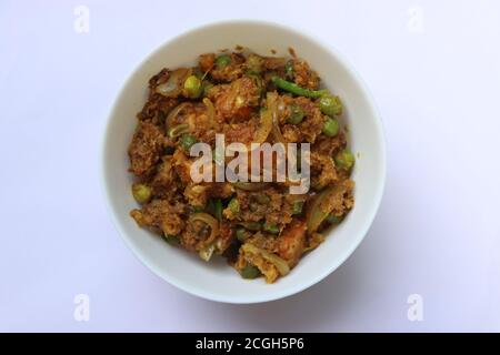 Paneer Sukka oder Paneer mutter Kokosnuss Masala, Paneer grünen Erbsen trocken, Curry mit Quark, indische Küche Stockfoto