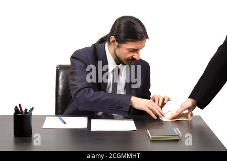 Geschäftsmann, der eine Bestechung als Gewinn annimmt Stockfoto