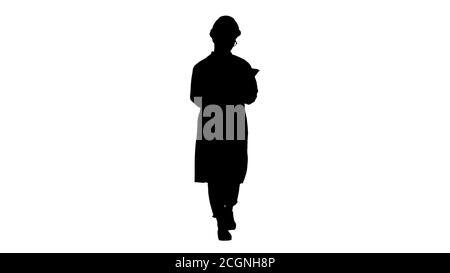 Silhouette Frau Ingenieur arbeiten auf Tablet. Stockfoto