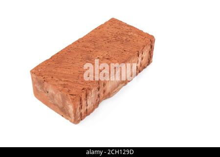 Ein einzelner roter Ziegel isoliert auf weißem Hintergrund, der rote Ziegel Symbol der Konstruktion. Objekt isoliert Stockfoto
