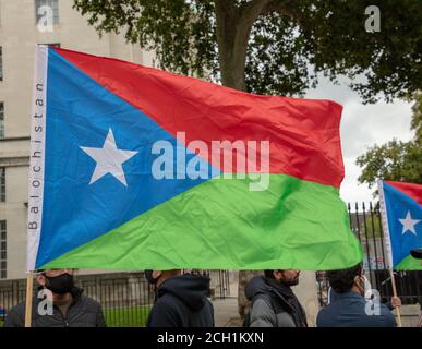 Flagge für Balochistan, siehe getragen von Demonstranten gegenüber Nummer 10 Downing Street, London. Stockfoto