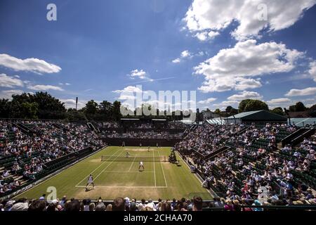 Johanna Konta und Maria Sanchez beim Doppelspiel gegen Timea Babos und Yaroslava Shvedova am 9. Tag der Wimbledon Championships im All England Lawn Tennis and Croquet Club, Wimbledon. Stockfoto