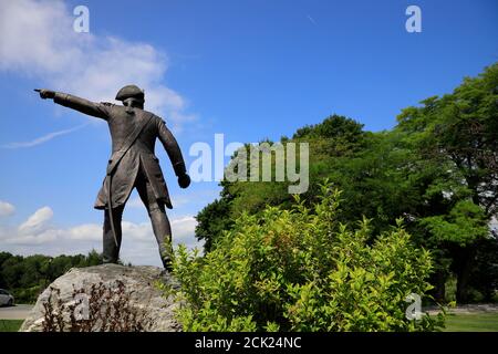 Statue des Brigadier General John stark des amerikanischen Revolutionskrieges Mit Bennington Battle Monument im Hintergrund.Bennington.Vermont Stockfoto