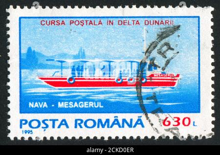 RUMÄNIEN - UM 1995: Briefmarke gedruckt von Rumänien, zeigt Dampfschiff, um 1995. Stockfoto