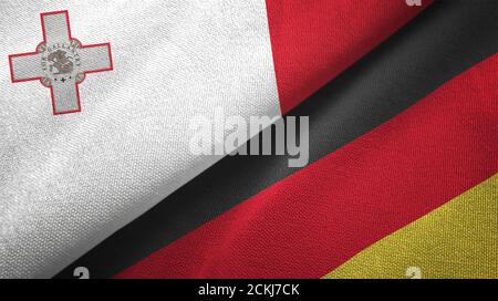 Malta und Deutschland zwei Flaggen Textiltuch, Stoff Textur Stockfoto