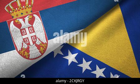 Serbien und Bosnien und Herzegowina zwei Flaggen Textiltuch, Stoff Textur Stockfoto