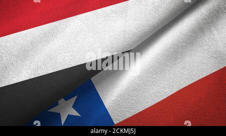 Jemen und Chile zwei Flaggen Textiltuch, Stoff Textur Stockfoto