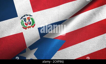 Dominikanische Republik und Puerto Rico zwei Flaggen Textiltuch, Stoff Textur Stockfoto