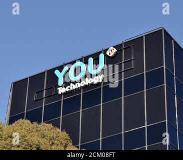 IHR Technologieschild befindet sich im Sierra Point Business Park, Brisbane, Kalifornien, 2015 Stockfoto