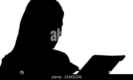 Silhouette lächelnde Geschäftsfrau mit einem Tablet-Computer. Stockfoto