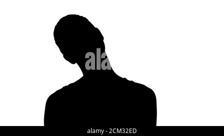 Silhouette glücklich junge Frau Blick auf die Kamera mit Lächeln, während Stockfoto