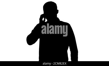 Silhouette junge Mann am Telefon sprechen und Wandern. Stockfoto