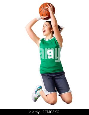 Junges Mädchen-Basketball-Spieler isoliert Stockfoto