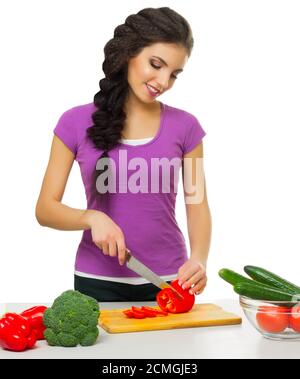 Junge Frau bereitet der Küchenchef Essen isoliert Stockfoto