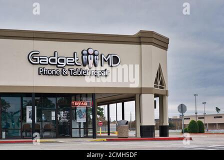 Humble, Texas/USA 11/28/2019: Gadget MD Telefon und Tablet Reparatur-Shop in Humble, TX. Gelegen in Humblewood Shopping Plaza. Stockfoto