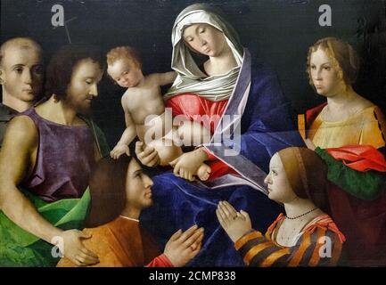 Italien Emilia Romagna Modena: Galerie Estense - Madonna mit Kind mit Heiligen und Stiftern von di Vincenzo Catena 15. Jahrhundert Stockfoto