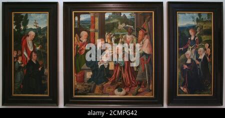 Joos van Cleve - Triptychon mit der Anbetung der Könige. Stockfoto