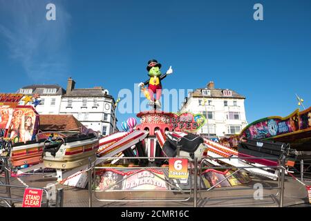 Cartoon Frosch Figur auf einem Festplatz Fahrt Stockfoto