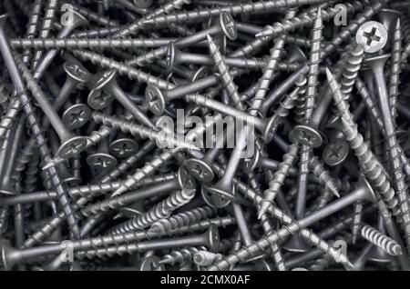 Schwarze Gewindebohrer für den Bau als Hintergrund Stockfoto