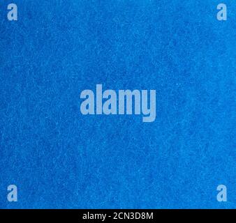 Blaue Textur eines Küchenschwamms mit Fasern, Vollrahmen Stockfoto