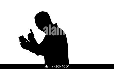 Silhouette Porträt des erfolgreichen schönen jungen Mann Video chati Stockfoto