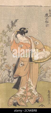 Der Schauspieler Onoya Matsusuke, in weiblicher Robe von O-Kane, passt den Kamm in seinem Haar, 1735-1785. Stockfoto