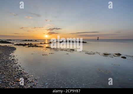 Sonnenaufgang über der Ostsee auf der Pilotinsel Schleimünde, bei Maasholm, Schleswig-Holstein, Deutschland Stockfoto