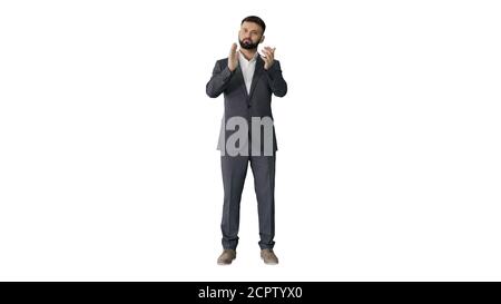 Schöner Geschäftsmann mit Bart applaudieren auf weißem Hintergrund. Stockfoto