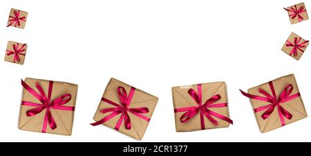 Weihnachtsbanner mit Geschenken, kleine Schachteln mit rotem Band Stockfoto