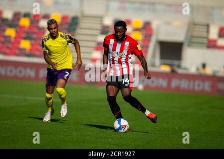 London, Großbritannien. September 2020. Josh Dasilva (14) von Brentford in Aktion. EFL Skybet Championship match, Brentford gegen Huddersfield Town im Brentford Community Stadium in Brentford, London am Samstag, 19. September 2020 . Dieses Bild darf nur für redaktionelle Zwecke verwendet werden. Nur redaktionelle Verwendung, Lizenz für kommerzielle Nutzung erforderlich. Keine Verwendung in Wetten, Spiele oder ein einzelner Club / Liga / Spieler Publikationen. PIC von Tom Smeeth / Andrew Orchard Sport Fotografie / Alamy Live News Kredit: Andrew Orchard Sport Fotografie / Alamy Live News Stockfoto