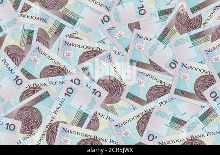 10 polnische Zloty-Scheine liegen im großen Haufen. Reiche Leben konzeptuellen Hintergrund. Viel Geld Stockfoto