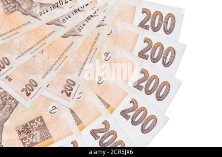 200 Tschechische korun Bills liegt isoliert auf weißem Hintergrund mit Kopieplatz in Fächerform in Nahaufnahme gestapelt. Konzept für Finanztransaktionen Stockfoto