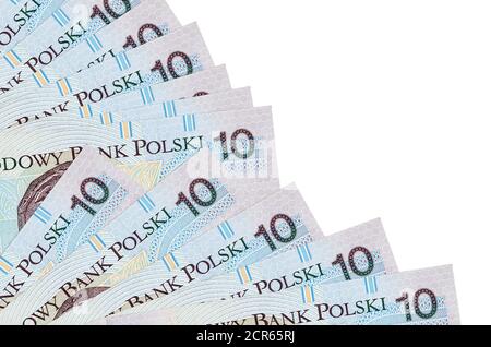 10 Polnische Zloty Bills liegt isoliert auf weißem Hintergrund mit Kopieplatz in Fan-Nahaufnahme gestapelt. Zahltag Zeit Konzept oder finanzielle Operationen Stockfoto