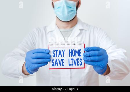 Handschrift Text Stay Home Save Lives. Konzeptionelle Foto verringern die Anzahl der infizierten Patienten, indem sie nicht das Haus Laborant Featurin verlassen Stockfoto