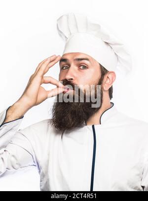 Professioneller Koch Mann zeigt Zeichen für lecker. Koch, kochen leckere köstliche Geste durch Küssen der Finger Stockfoto