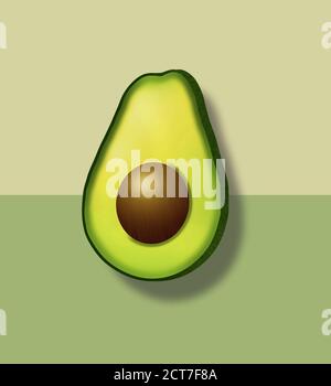 Auf einem grünen Hintergrund ist ein halbiert geschnittener Avocado zu sehen. Stockfoto