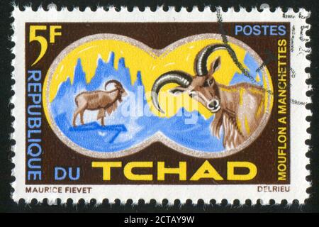 TSCHAD - UM 1965: Briefmarke gedruckt von Tschad, zeigt Aoudad oder Barbary Schafe, um 1965 Stockfoto