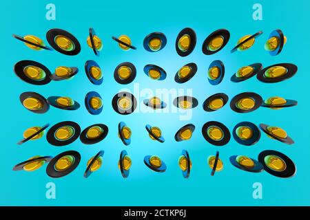 3D-Rendering eines gelben und schwarzen Gyroskopes auf blauem Hintergrund. Eine einfache geometrische Figur von Kugeln in verschiedenen Größen. Сyber Form in Cartoon st Stockfoto