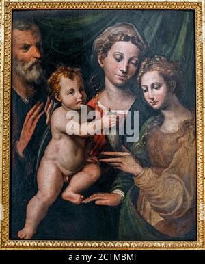 Italien Emilia Romagna - Rimini - Museo della città - Madonna mit Kind, dem Heiligen Josef und der Heiligen Maria Magdalena - Öl auf dem Tisch von Biagio Pupini Stockfoto