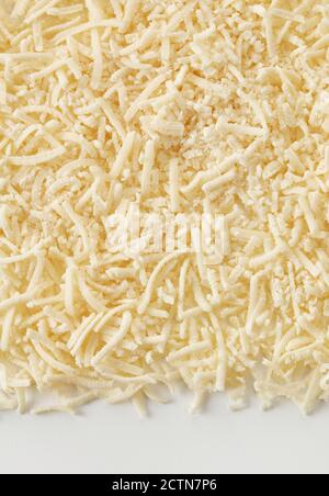 Rasierte Parmesan-Käse Hintergrund Stockfoto